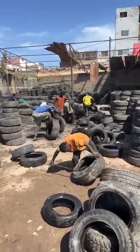 Our crew sorting tyres in the Dakar yard