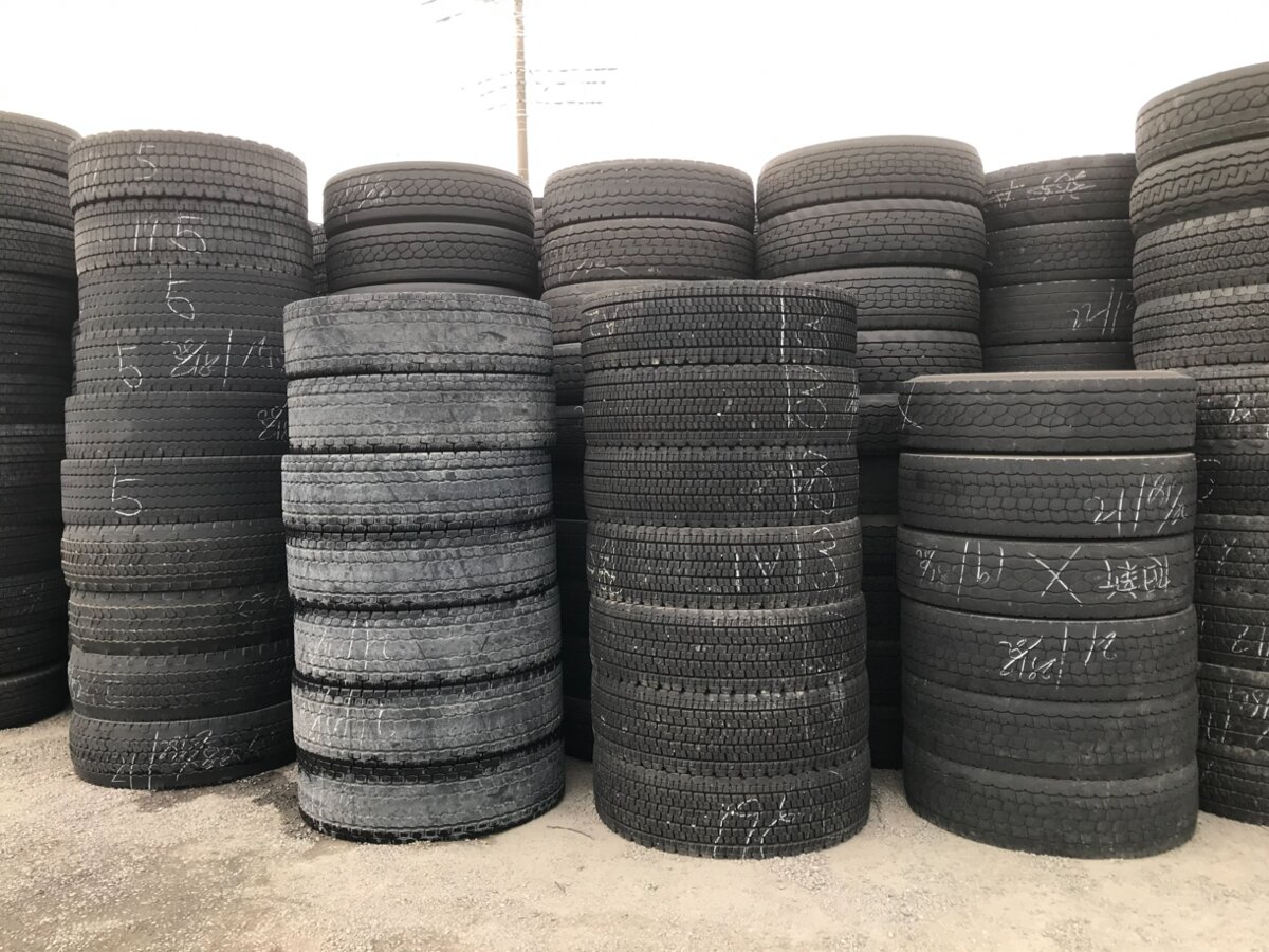 Truck and bus tyres stacked in the yard
