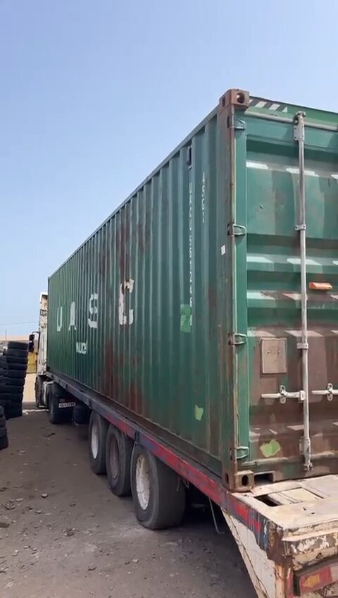 A 40ft container arriving at the yard on a trailer
