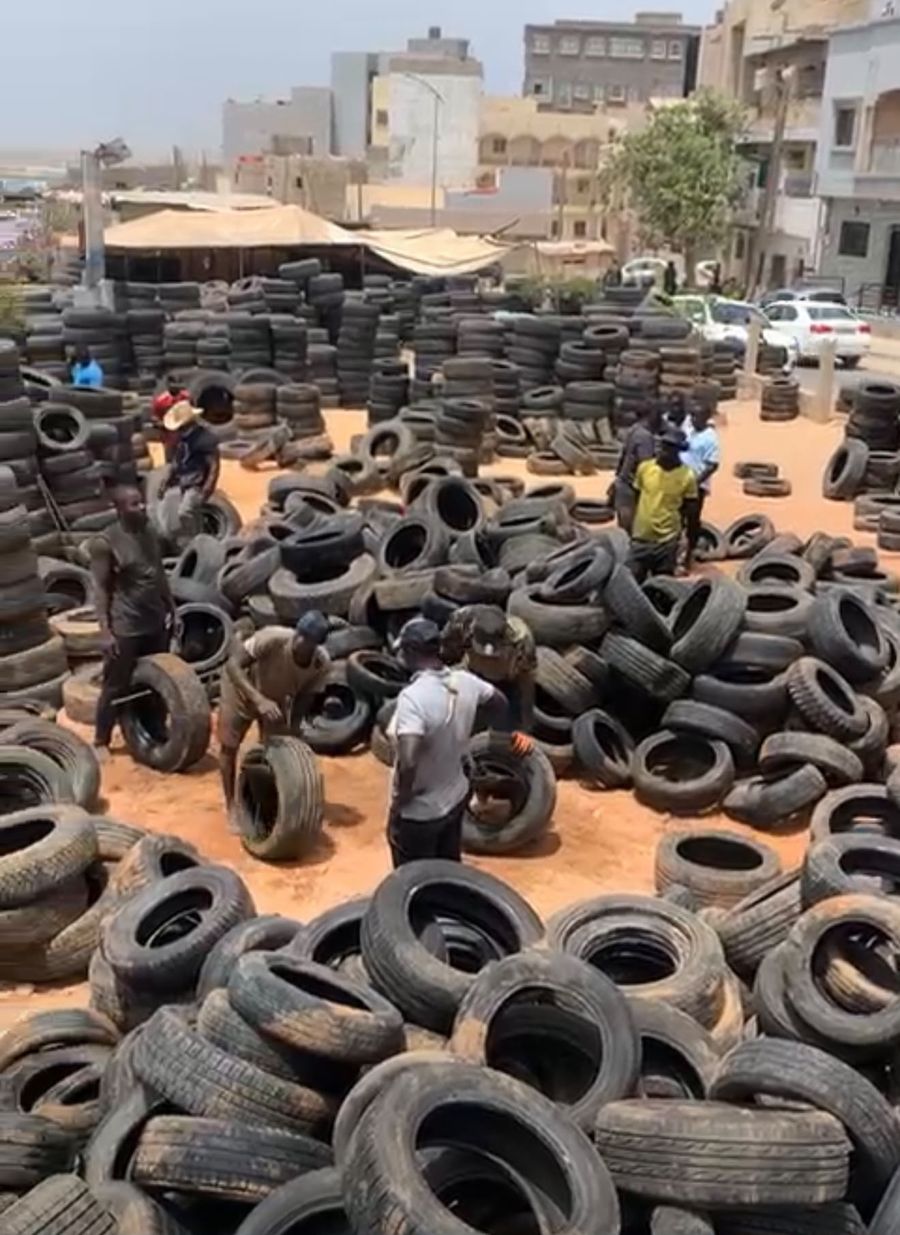 Our team sorting tyres at the Dakar yard