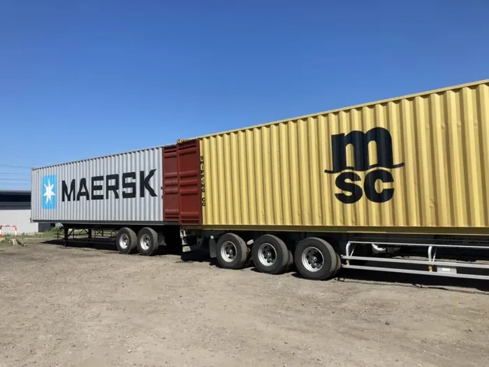 Outbound containers coupled and ready to leave the yard.